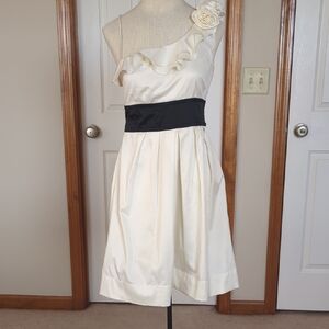 Elegant Cream One-Shoulder Dress with Black Accent